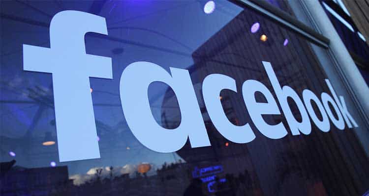facebook-logo Facebook logo on glass